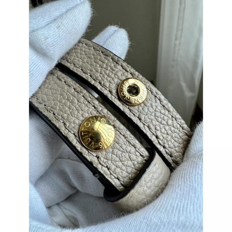 Pochette MetisEAST WEST 手袋 M23081_19