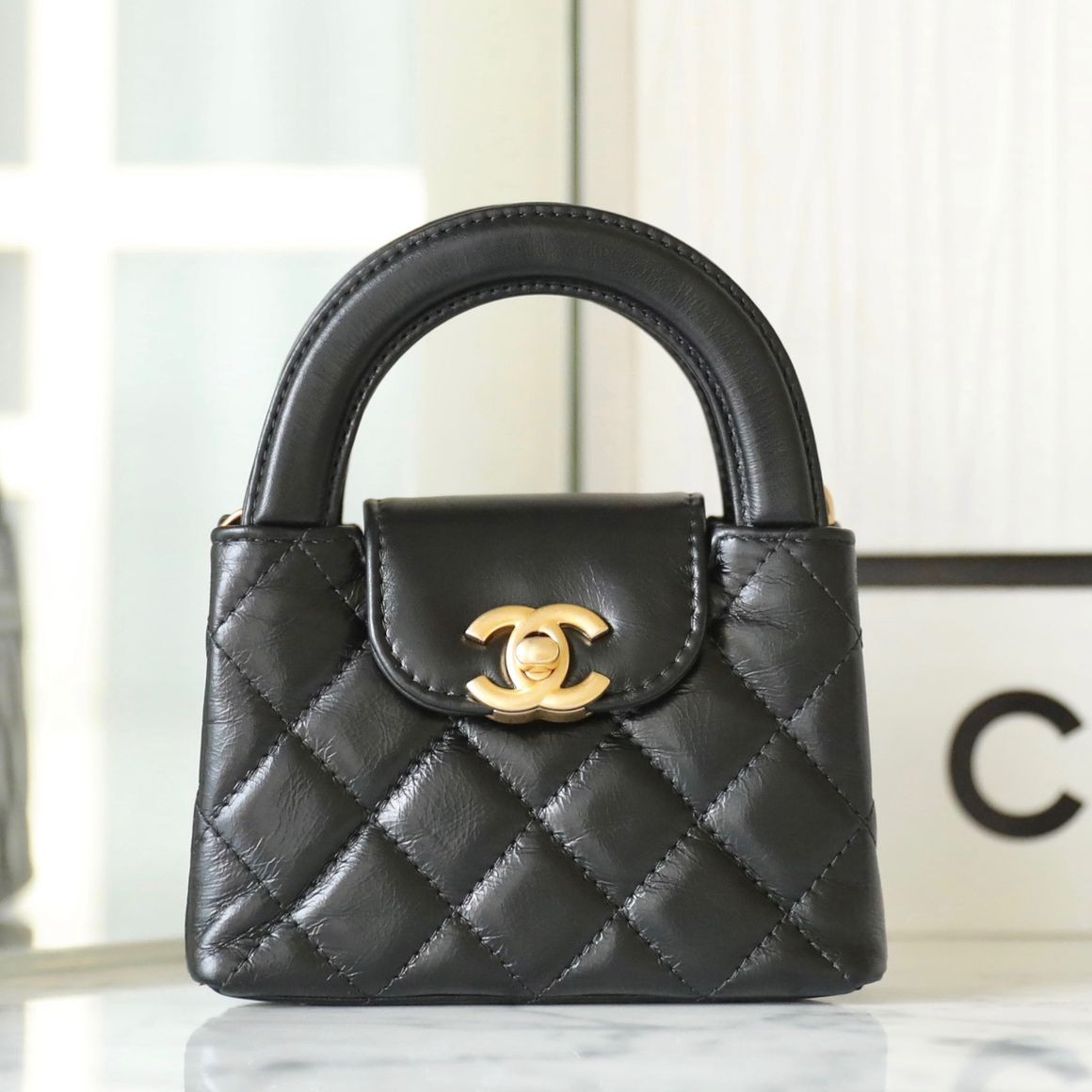 小香 23K秋冬 Kelly鏈條手拿包 小號 黑色_1