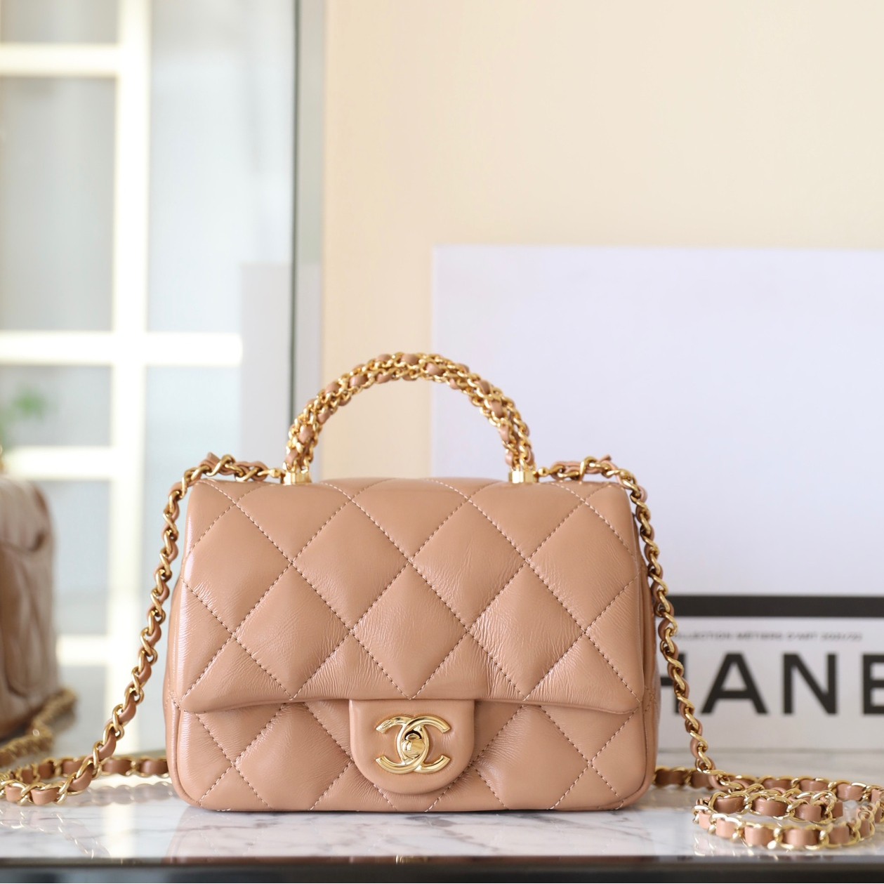 24B秋冬擰鏈手柄郵差包小號 奶茶色_1